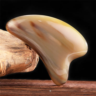 Gesichtsschönheit Gua Sha Werkzeug Stier Horn Herzförmiges Schabbrett für Körper Hautpflege und Akupunktur Stick