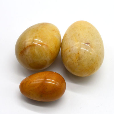 Regionale Besonderheit Gelbe Jade-Eier Kegel-Übung Semi-Edelstein-Eier Für die Liebe Thema