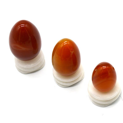 OEM ODM Akzeptiert Rotkarnelien Yoni Eier Semi Edelstein Eier Bohrmassage Stil