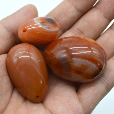 Regionale Besonderheit Yoni Ei Karnelien und Rot Jade Ei für Vaginalübungen 45*30mm