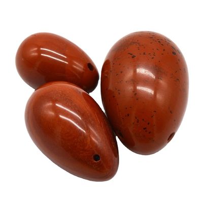 Rot Jaspisch geschnitzte, gebohrte Jade-Eier Natürliche Yoni-Eier für die physiologische Gesundheit von Frauen OEM genehmigt