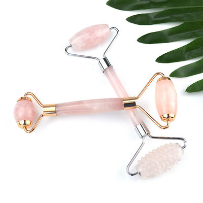 Besonderes Logo verfügbard Natürliches Rose Quarz Gold Griffe Gesichts Jade Roller Rosa Kristall Massager Für Haut Schönheitsbehandlung