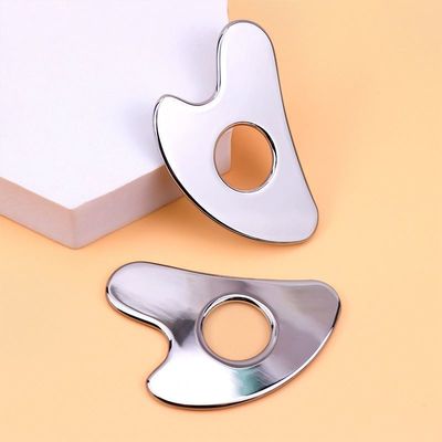 Edelstahl Herzförmige Hohl Gua Sha Board Metall Gesichtsschönheitsmittel für Ganzkörpermassage und OEM / ODM
