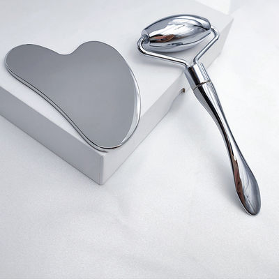 Massage-Ausrüstung benutzerdefiniertes Logo verfügbard Anti-Aging Silber 304 Edelstahl Metall Gua Sha Gesicht Roller Augencreme Stick