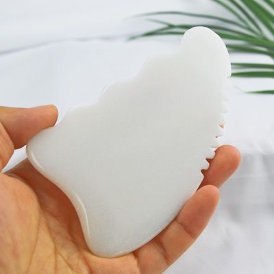 Personalisiertes Logo erhältlichd Weißer Jade Gua Sha Stein Gesichtsmassager für Anti-Aging Behandlung