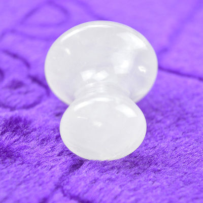 Klares Quarz Gua Sha für Gesichtsschlankung und Abbau Massage Ganzkörper Abdeckung 41*35mm Naturpilz Steinform