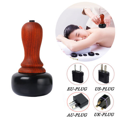 Elektrische Gua Sha Cupping Massage Therapie mit heißen Steinen zur Entspannung der Muskeln Hautkratzen und Moxibustion Behandlung am Körper