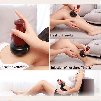 Elektrische Gua Sha Cupping Massage Therapie mit heißen Steinen zur Entspannung der Muskeln Hautkratzen und Moxibustion Behandlung am Körper