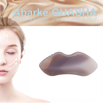 Natürliche Agate Gua Sha Board für Körpermassage und Gesichtsbehandlung in SPA Akupunkturtherapie