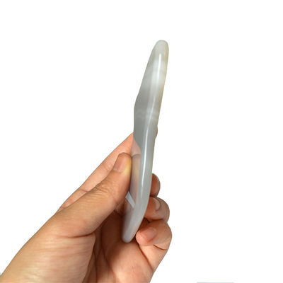 Graue Achat Guasha Massagebrett für die persönliche Gesundheitsversorgung und Lymphdrainage