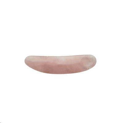 Reduzieren Sie Schwellungen mit geschwungenem kosmetischen Spatula und Mini Rose Quarz Augencreme Applikator auf Gesicht Gua Sha Massage Stick