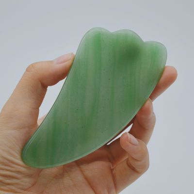 Erleben Sie die heilenden Eigenschaften der natürlichen grünen Aventurine Jade Gua Sha Scraping Massage für Body Massager