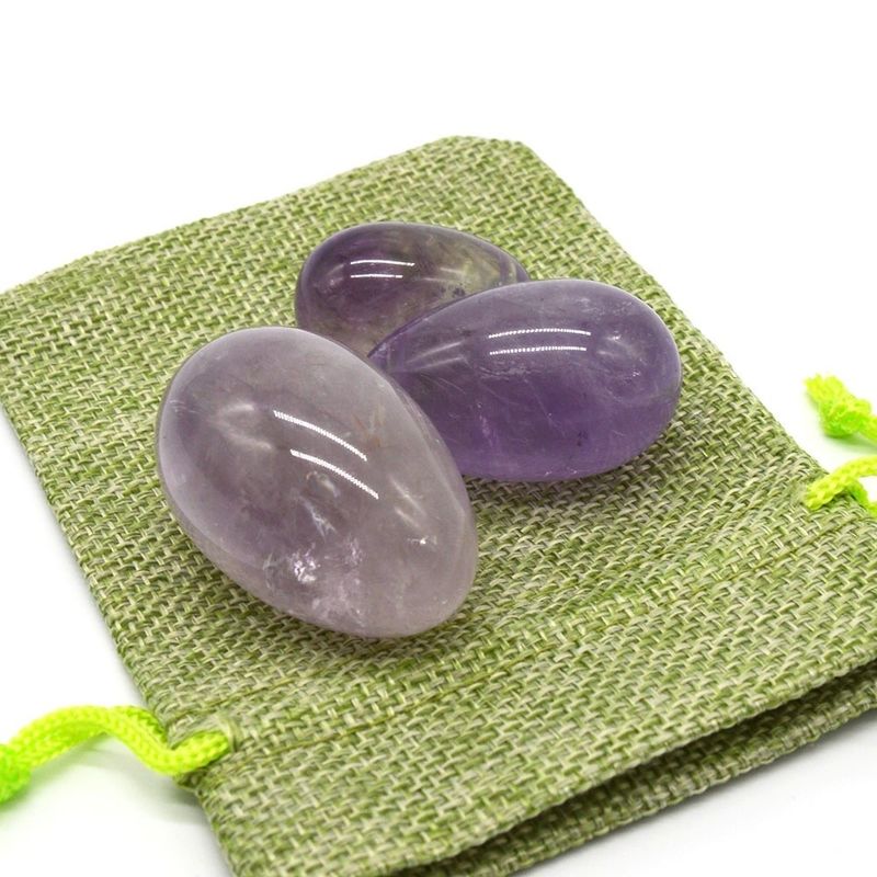 OEM akzeptiert geschnitzte Yoni Eier für Vaginalübungen natürliche Bohrungen Amethyst Jade Eier