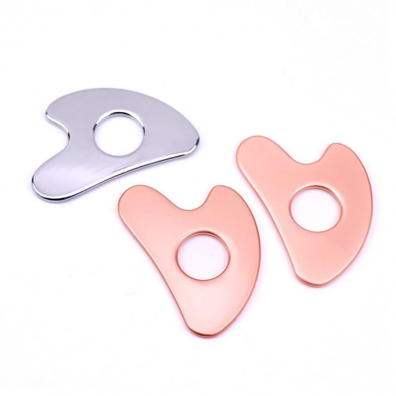 Edelstahl Herzförmige Hohl Gua Sha Board Metall Gesichtsschönheitsmittel für Ganzkörpermassage und OEM / ODM
